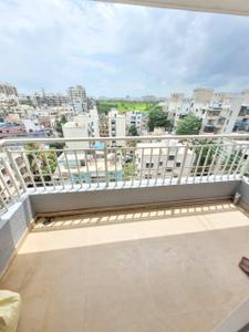 Balcony Image of 690 Sq.ft 1 BHK Apartment / Flat for rent in Surya Nagari society, Pimple Gurav Pune for Rs. 15000