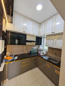 Kitchen Image of 601 Sq.ft 1 BHK Apartment / Flat for rent in Olympia Opaline, Navalur Chennai for Rs. 29000
