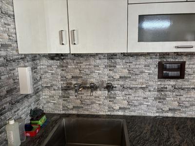 Kitchen Image of 700 Sq.ft 1 BHK Independent House for rent in Sector 26 Noida for Rs. 24000