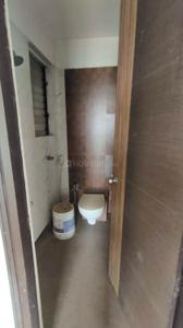 Bathroom Image of 710 Sq.ft 1 BHK Apartment / Flat for sale in Tharwani Vedant Millenia Happiness, Titwala Thane for Rs. 2600000