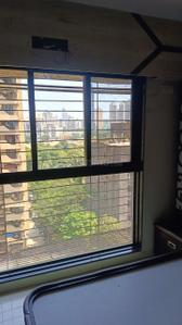 Bedroom Image of 410 Sq.ft 1 BHK Apartment / Flat for sale in Raunak Heights, Kasarvadavali Thane for Rs. 5800000