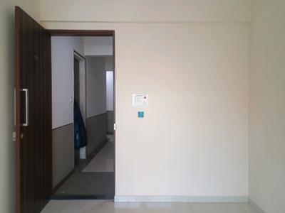 Living Room Image of 720 Sq.ft 1 BHK Apartment / Flat for sale in Rkr Precious Empire Wing A B And C, Ambernath East Ambernath for Rs. 2500000