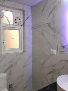 Bathroom Image of 550 Sq.ft 1 BHK Apartment / Flat for rent in Aditya Urban Royale, Bamheta Village Ghaziabad for Rs. 20000