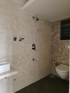 Common Bathroom Image of 660 Sq.ft 1 BHK Apartment / Flat for sale in Munish Emonics Tower, Vasai East Vasai for Rs. 3877000