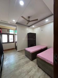 Bedroom Image of Singh pg in Janakpuri, New Delhi