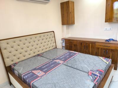 Bedroom Image of 900 Sq.ft 2 BHK Builder Floor for rent in Lajpat Nagar New Delhi for Rs. 75000