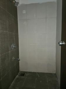 Common Bathroom One Image of 630 Sq.ft 1.5 BHK Apartment / Flat for sale in Majestique Palm Atlantis by Majestique Landmarks, Wagholi Pune for Rs. 3751000