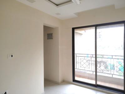 Living Room Image of 740 Sq.ft 1 BHK Apartment / Flat for rent in Unnati Woods Phase 7, Kasarvadavali Thane for Rs. 16500