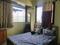Shaligram Apartment Bedroom 1
