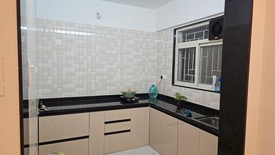 Kitchen Image of 826 Sq.ft 2 BHK Apartment / Flat for rent in Sai Pleasure, Wakad Pune for Rs. 32000