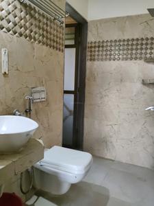 Common Bathroom Image of 951 Sq.ft 2 BHK Apartment / Flat for rent in Madhav Palacia, Hiranandani Estate Thane for Rs. 35000