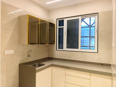 Kitchen Image of 897 Sq.ft 1 BHK Apartment / Flat for sale in Swaminarayan City, Dombivli West Thane for Rs. 7300000