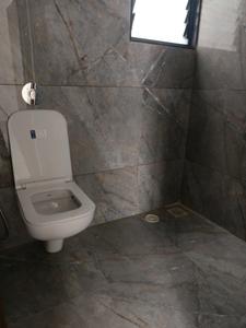 Common Bathroom Image of 1025 Sq.ft 2 BHK Apartment / Flat for sale in KP Archana Paradise Phase 03, Mohammed Wadi Pune for Rs. 6900000