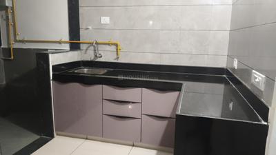 Kitchen Image of 1280 Sq.ft 2 BHK Apartment / Flat for rent in Sunbuildcon Suryansh Sanidhya Shivalaya, Sarkhej Ahmedabad for Rs. 19500