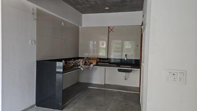 Kitchen Image of 2500 Sq.ft 3 BHK Apartment / Flat for sale in Atishay Shivalay III, Sargasan Gandhinagar for Rs. 11000000
