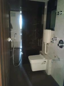 Common Bathroom Image of 690 Sq.ft 1 BHK Apartment / Flat for sale in Meera Nanda Bliss, Ambernath East Ambernath for Rs. 2399999