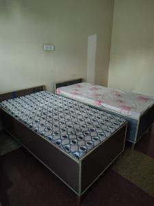 Bedroom Image of Unique PG in Sector 63 A, Noida