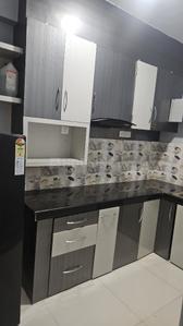 Kitchen Image of 823 Sq.ft 2 BHK Apartment / Flat for rent in Eternis, Madhyamgram Kolkata for Rs. 25000