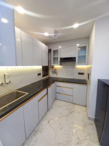 Kitchen Image of 720 Sq.ft 2 BHK Builder Floor for rent in Chhattarpur New Delhi for Rs. 35000