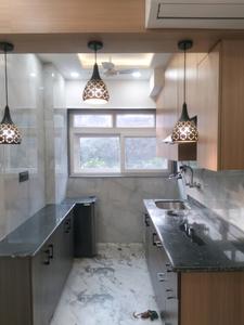 Kitchen Image of 370 Sq.ft 1 RK Apartment / Flat for sale in DLF Capital Greens, Karampura New Delhi for Rs. 4750000