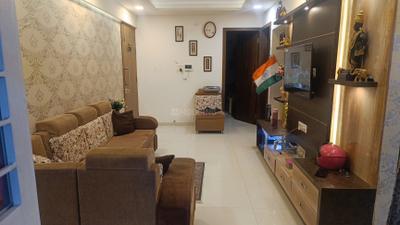 Living Room Image of 1040 Sq.ft 2 BHK Apartment / Flat for rent in Aakash Prabhukrupa Heights, Rane Nagar Nashik for Rs. 16000