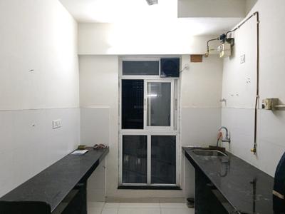 Kitchen Image of 650 Sq.ft 2 BHK Apartment / Flat for rent in Godrej Emerald, Kasarvadavali Thane for Rs. 25639