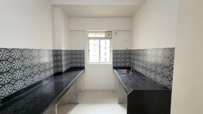 Kitchen Image of 616 Sq.ft 1 BHK Apartment / Flat for sale in Lodha Amara, Kolshet Thane for Rs. 7600000