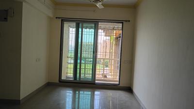Living Room Image of 695 Sq.ft 1 BHK Apartment / Flat for rent in Gajra Bhoomi Gardenia, Kalamboli Navi Mumbai for Rs. 19000