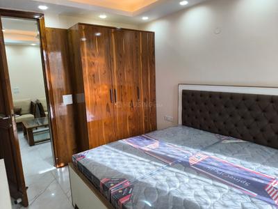 Bedroom Image of 900 Sq.ft 2 BHK Builder Floor for rent in Lajpat Nagar New Delhi for Rs. 75000