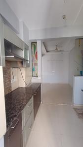 Kitchen Image of 955 Sq.ft 2 BHK Apartment / Flat for sale in Prateek Wisteria, Sector 77 Noida for Rs. 11200000