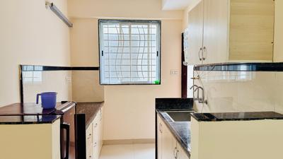 Kitchen Image of 940 Sq.ft 2 BHK Apartment / Flat for rent in Palasia Indore for Rs. 30000