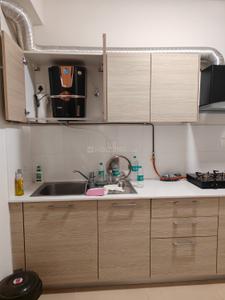 Kitchen Image of 1100 Sq.ft 2 BHK Apartment / Flat for rent in Bhartiya Nikoo Homes Phase 2, Thanisandra Bengaluru for Rs. 43000