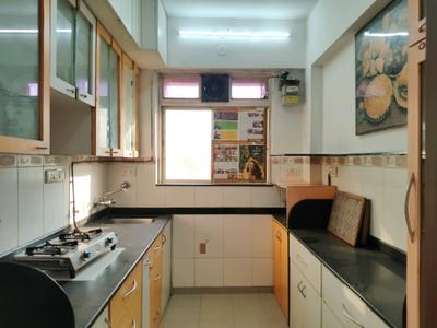 Kitchen Image of 845 Sq.ft 2 BHK Apartment / Flat for rent in Kasarvadavali Thane for Rs. 25000