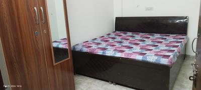 Bedroom Image of GIRLS PG WITH ATTACHED BATHROOM in Sector 18, Noida