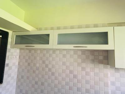 Kitchen Image of 650 Sq.ft 1 BHK Apartment / Flat for sale in Charms Paradise, Titwala Thane for Rs. 2700000