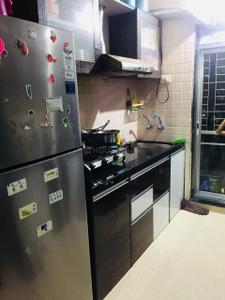 Kitchen Image of 687 Sq.ft 1 BHK Apartment / Flat for sale in Amber Enclave, Thakurli Thane for Rs. 4800000