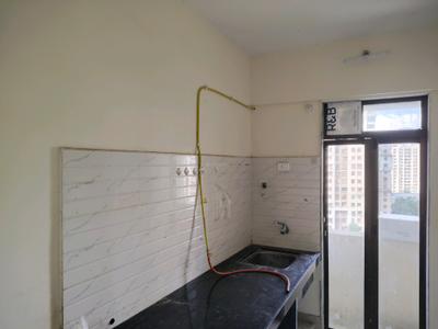 Kitchen Image of 700 Sq.ft 1 BHK Apartment / Flat for rent in Raunak Heights, Kasarvadavali Thane for Rs. 16122