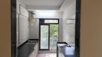 Kitchen Image of 1200 Sq.ft 3 BHK Apartment / Flat for sale in JE And VEE Om Trimurti, Malad East Mumbai for Rs. 31000000