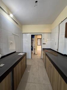 Kitchen Image of 1000 Sq.ft 2 BHK Apartment / Flat for rent in Neelkanth Residency, Seawoods Navi Mumbai for Rs. 65000