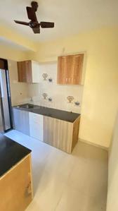 Kitchen Image of 950 Sq.ft 2 BHK Apartment / Flat for sale in Shanmukhi Bilvam, Shedung Navi Mumbai for Rs. 5200000