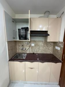 Kitchen Image of 950 Sq.ft 1 BHK Builder Floor for rent in CGHS Urban Green, Sector 39 Gurgaon for Rs. 32000