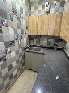 Kitchen Image of 550 Sq.ft 2 BHK Builder Floor for rent in Jhandewalan New Delhi for Rs. 28025