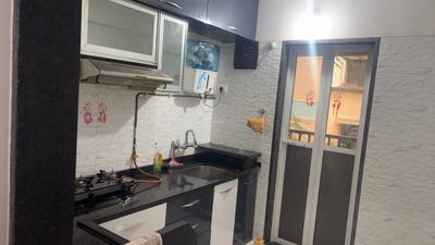 Kitchen Image of 550 Sq.ft 1 BHK Apartment / Flat for rent in Atlantic Jewels, Hiranandani Estate Thane for Rs. 30000