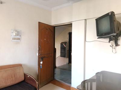 Living Room Image of 600 Sq.ft 1 BHK Apartment / Flat for rent in Puraniks Kanchan Pushp Society, Hiranandani Estate Thane for Rs. 20000