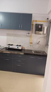 Kitchen Image of 640 Sq.ft 1 BHK Apartment / Flat for rent in Applewoods Satyesh Residency, Shela Ahmedabad for Rs. 21000