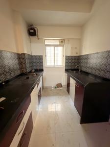 Kitchen Image of 600 Sq.ft 1 BHK Apartment / Flat for rent in Lodha Amara, Kolshet Thane for Rs. 28500
