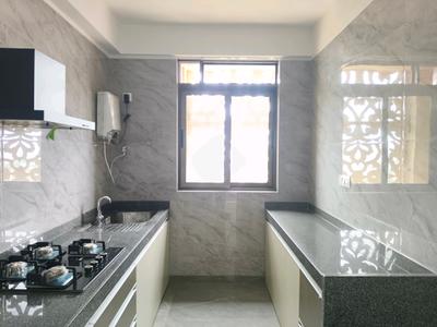 Kitchen Image of 1115 Sq.ft 2 BHK Apartment / Flat for sale in Tharwani Majestic Towers Phase I, Kalyan West Kalyan for Rs. 9900000