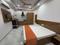 Bedroom Image of Urbanroomz Coliving PG in Sector 30, Gurgaon