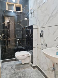 Common Bathroom Image of 600 Sq.ft 2 BHK Apartment / Flat for sale in Dwarka Mor New Delhi for Rs. 3700000