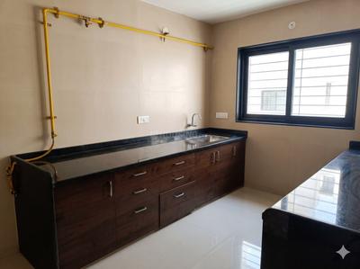 Kitchen Image of 1250 Sq.ft 2 BHK Apartment / Flat for rent in S2N Orchid Harmony, Palanpur Surat for Rs. 17000